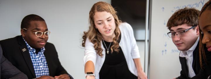 Students at a business meeting